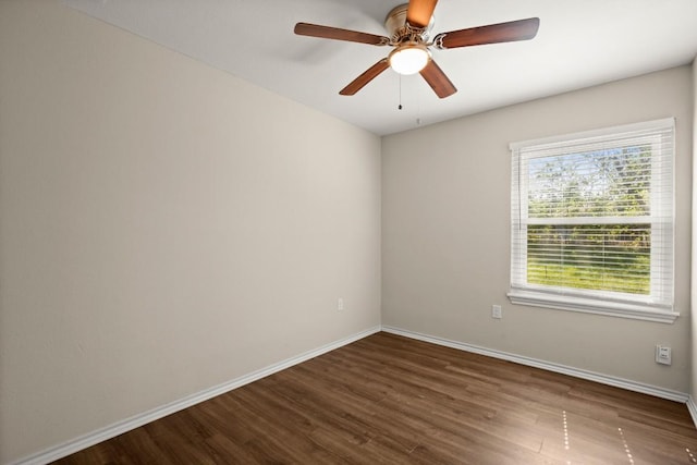 4603 Englewood Dr, Austin, TX 78745 - unfurnished room featuring dark wood finished floors, baseboards, and a ceiling fan