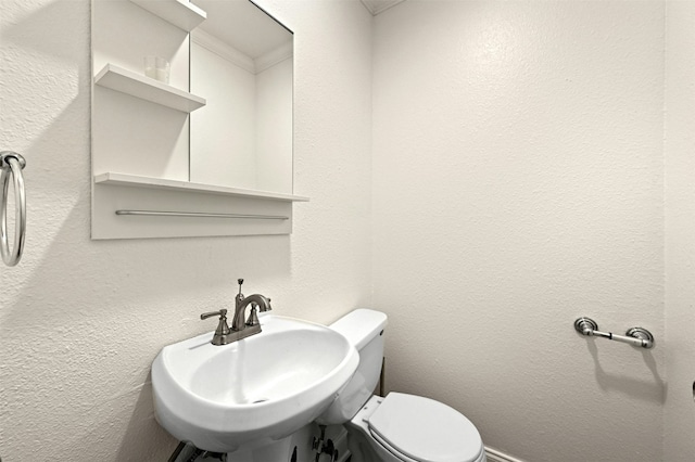 2122 Hancock Dr Unit 103, Austin, TX 78756 - half bathroom with a sink and toilet