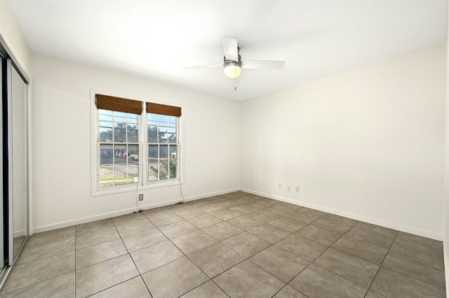 2122 Hancock Dr Unit 103, Austin, TX 78756 - tiled spare room with a ceiling fan and baseboards