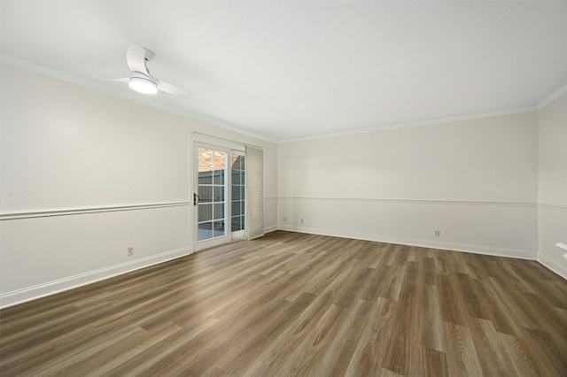 2122 Hancock Dr Unit 103, Austin, TX 78756 - unfurnished room featuring crown molding, wood finished floors, baseboards, and ceiling fan