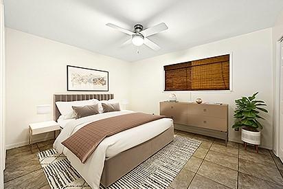 2122 Hancock Dr Unit 103, Austin, TX 78756 - bedroom featuring baseboards, ceiling fan, and tile patterned flooring