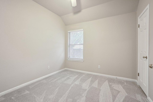 8400 Fern Bluff Ave, Round Rock, TX 78681 - empty room featuring light carpet, baseboards, vaulted ceiling, and ceiling fan