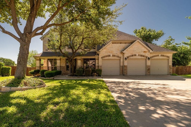 view of front of home featuring concrete driveway, stone siding, and an attached garage