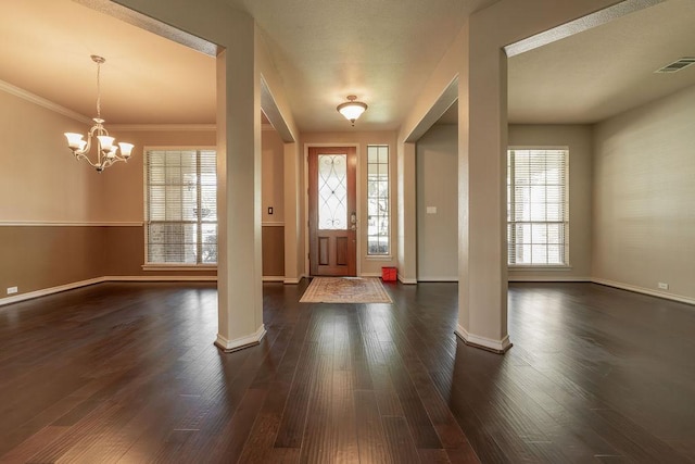 604 Riley Trl, Cedar Park, TX 78613 - entrance foyer with ornate columns, plenty of natural light, and baseboards