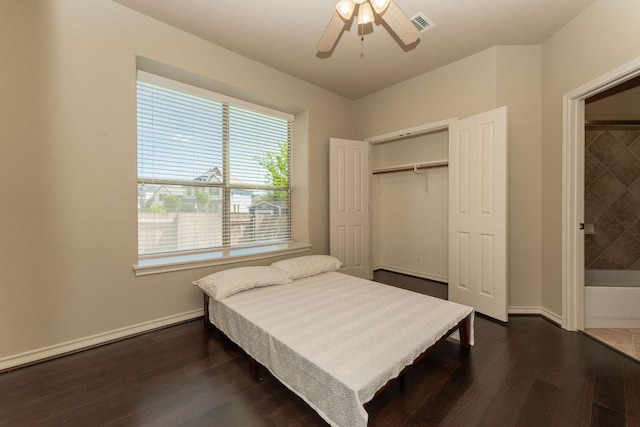 604 Riley Trl, Cedar Park, TX 78613 - bedroom with dark wood-style flooring, multiple windows, baseboards, and a closet