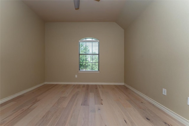 604 Riley Trl, Cedar Park, TX 78613 - empty room featuring light wood-style flooring, ceiling fan, baseboards, and vaulted ceiling