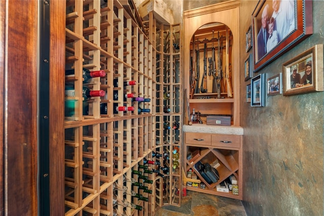 wine room with stone finish floors
