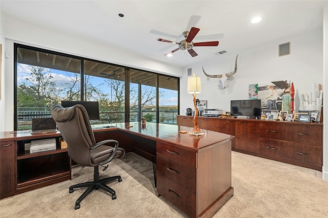 office space with light colored carpet, a ceiling fan, and recessed lighting