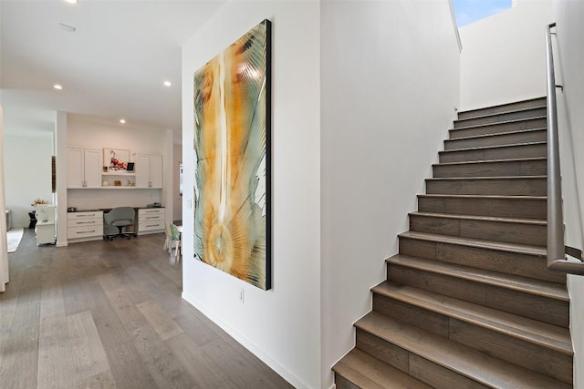 2500 Cedarview Dr, Austin, TX 78704 - stairway with wood finished floors, recessed lighting, and built in desk