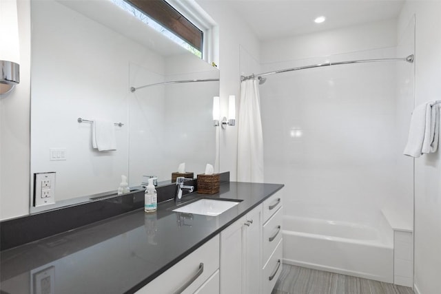 2500 Cedarview Dr, Austin, TX 78704 - bathroom with vanity, shower / bath combination with curtain, and wood finished floors