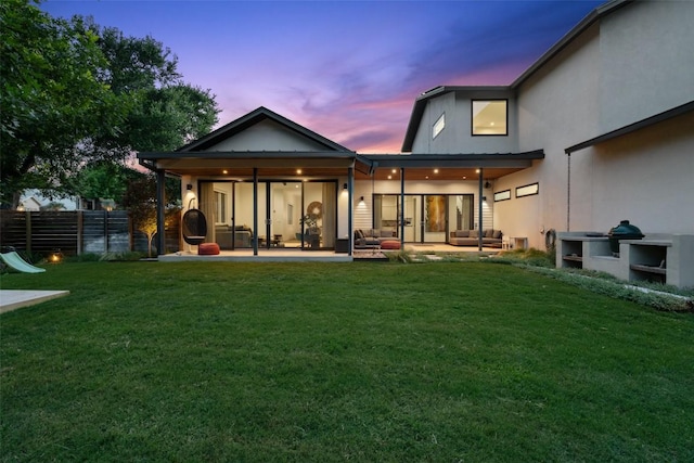 2500 Cedarview Dr, Austin, TX 78704 - rear view of property with an outdoor living space, a patio area, and stucco siding