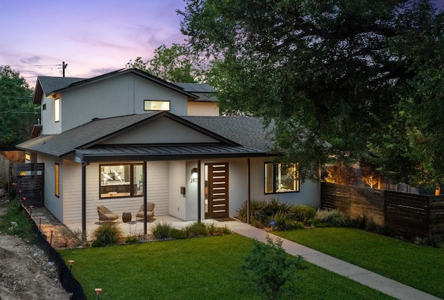 2500 Cedarview Dr, Austin, TX 78704 - view of front of property with a standing seam roof, a shingled roof, a metal roof, and solar panels