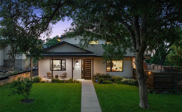 2500 Cedarview Dr, Austin, TX 78704 - view of front of home featuring stucco siding and a shingled roof