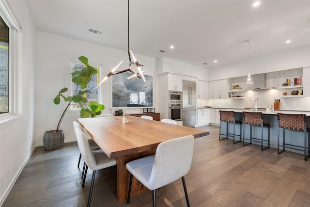 2500 Cedarview Dr, Austin, TX 78704 - dining area with dark wood finished floors and recessed lighting
