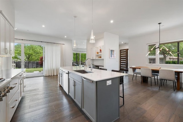 2500 Cedarview Dr, Austin, TX 78704 - kitchen featuring white cabinets, dishwasher, light countertops, plenty of natural light, and recessed lighting