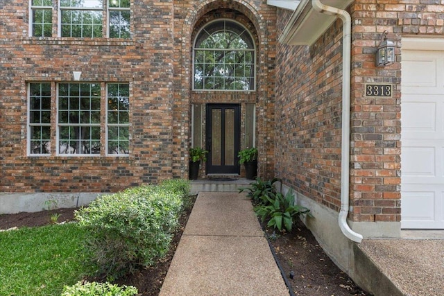 3313 Oxsheer Dr, Austin, TX 78732 - view of exterior entry with brick siding and french doors