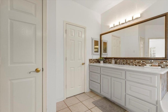 3313 Oxsheer Dr, Austin, TX 78732 - bathroom featuring vanity, decorative backsplash, and tile patterned floors