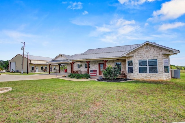 603 Watterson Rd Unit B, Bastrop, TX 78602 - single story home featuring stone siding, cooling unit, concrete driveway, a porch, and a carport