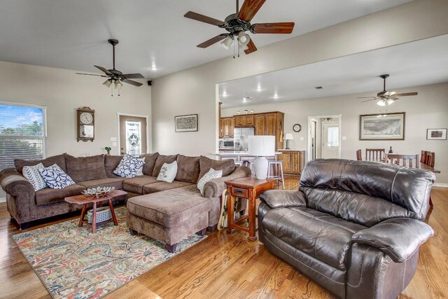 603 Watterson Rd Unit B, Bastrop, TX 78602 - living area with a ceiling fan and light wood-style floors