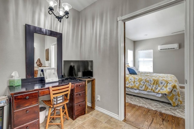 603 Watterson Rd Unit B, Bastrop, TX 78602 - office space with a wall mounted air conditioner, baseboards, and a chandelier