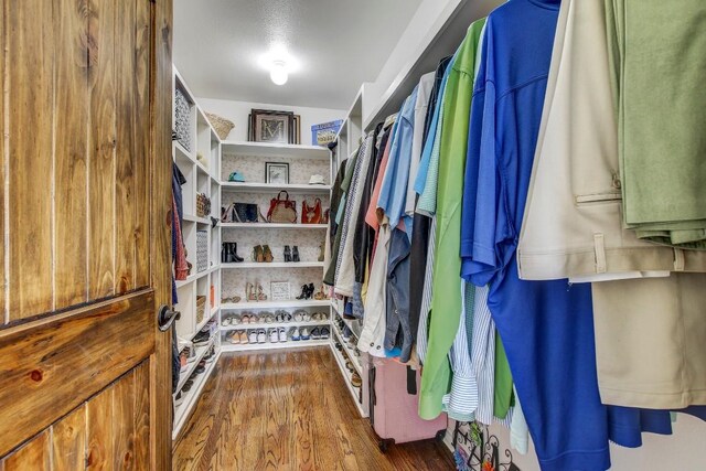 603 Watterson Rd Unit B, Bastrop, TX 78602 - spacious closet with dark wood finished floors