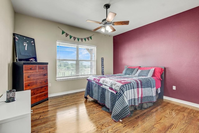 603 Watterson Rd Unit B, Bastrop, TX 78602 - bedroom featuring wood finished floors, baseboards, and ceiling fan