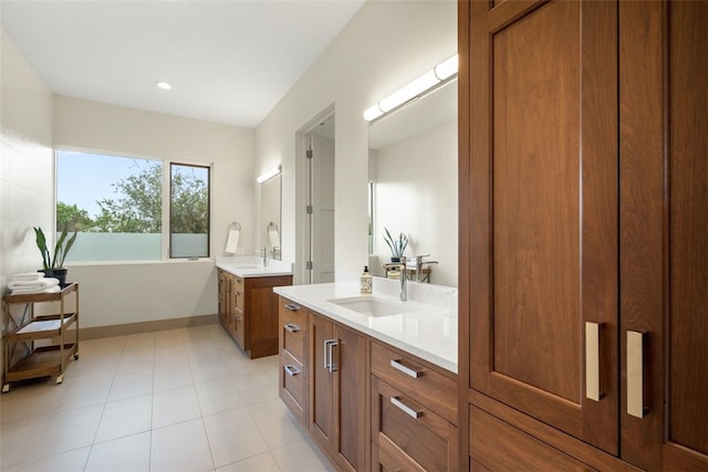 302 Bent Tree Ct, West Lake Hills, TX 78746 - full bathroom featuring two vanities, baseboards, and recessed lighting