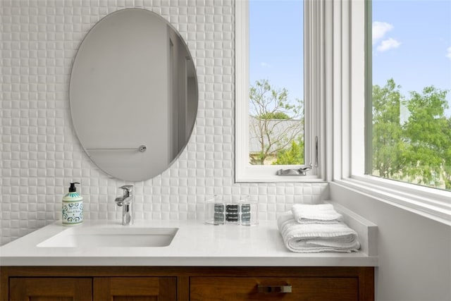302 Bent Tree Ct, West Lake Hills, TX 78746 - bathroom with decorative backsplash and vanity