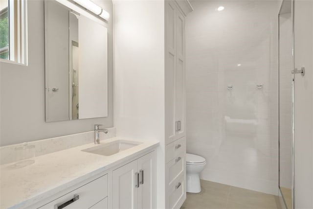 302 Bent Tree Ct, West Lake Hills, TX 78746 - full bathroom featuring toilet, vanity, tile patterned floors, and a shower