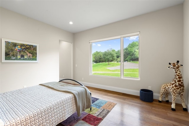 302 Bent Tree Ct, West Lake Hills, TX 78746 - bedroom with wood finished floors, baseboards, and recessed lighting