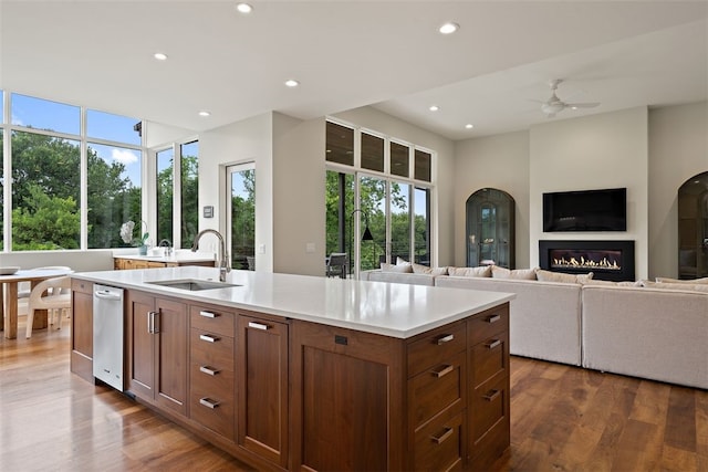 302 Bent Tree Ct, West Lake Hills, TX 78746 - kitchen with a sink, recessed lighting, ceiling fan, dark wood finished floors, and light countertops