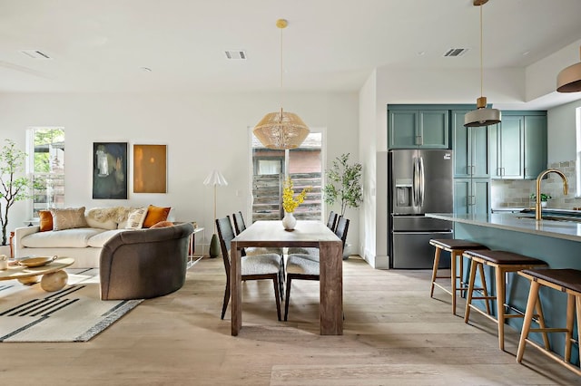 1406 Cometa St Unit 1, Austin, TX 78721 - dining room with light wood-type flooring