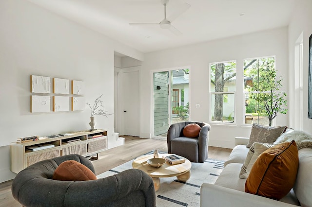 1406 Cometa St Unit 1, Austin, TX 78721 - living room with light wood-style floors and a ceiling fan