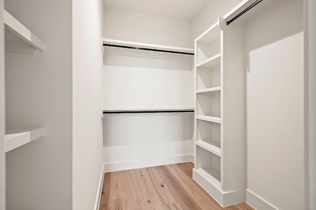 1406 Cometa St Unit 1, Austin, TX 78721 - spacious closet featuring wood finished floors