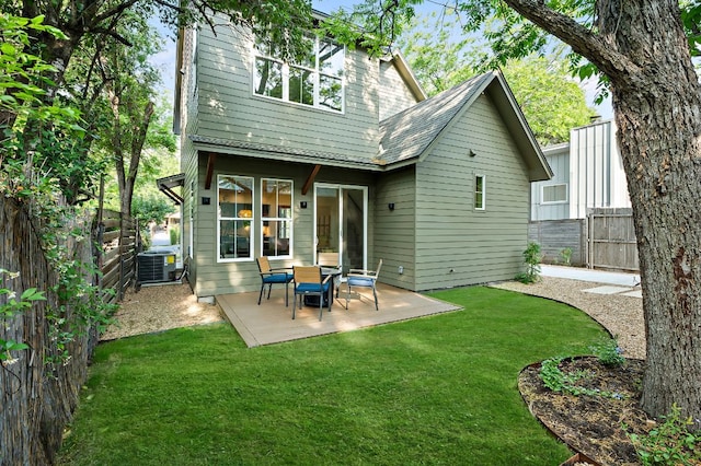 1406 Cometa St Unit 1, Austin, TX 78721 - rear view of property featuring central AC unit and a patio area