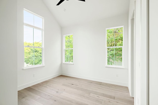 1406 Cometa St Unit 1, Austin, TX 78721 - empty room with ceiling fan, light wood-style floors, baseboards, and lofted ceiling