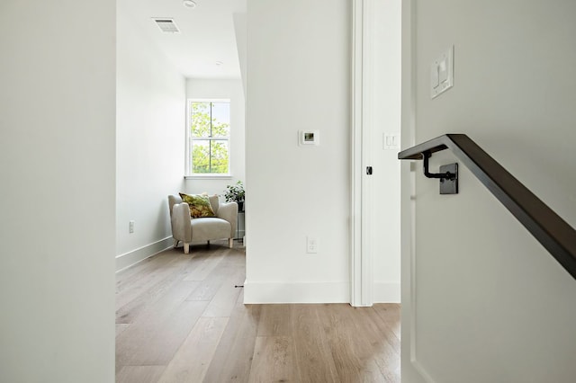 1406 Cometa St Unit 1, Austin, TX 78721 - hall with light wood-style floors and baseboards