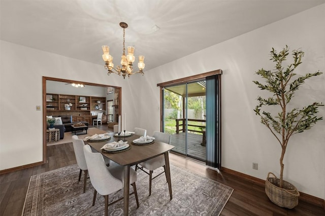 2821 Creek Side Dr, Temple, TX 76502 - dining space featuring baseboards, wood finished floors, and a chandelier