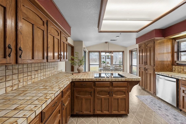 2821 Creek Side Dr, Temple, TX 76502 - kitchen featuring tile countertops, dishwasher, black electric cooktop, a peninsula, and backsplash
