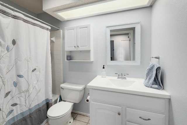bathroom featuring vanity, tile patterned floors, toilet, and shower / bath combo