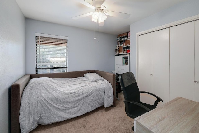 bedroom featuring carpet, a closet, and ceiling fan