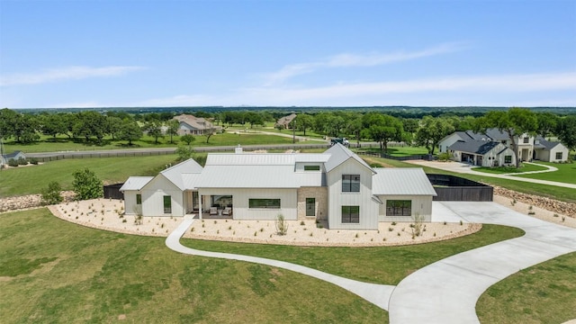 298 Glenview Cir, Belton, TX 76513 - back of house with a yard and metal roof