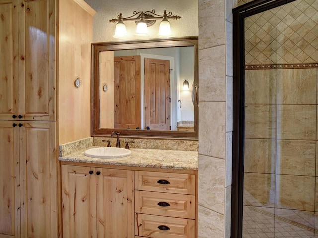 123 County Rd, Paige, TX 78659 - full bath featuring vanity and a tile shower