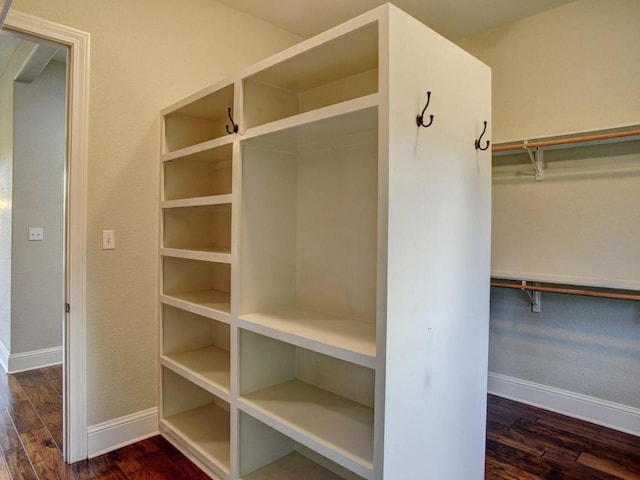 123 County Rd, Paige, TX 78659 - spacious closet featuring dark wood-style flooring