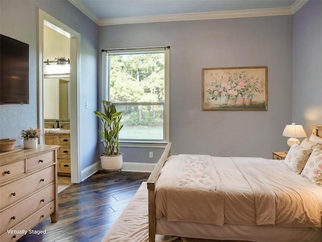 123 County Rd, Paige, TX 78659 - bedroom featuring dark wood-type flooring, baseboards, ornamental molding, connected bathroom, and a sink
