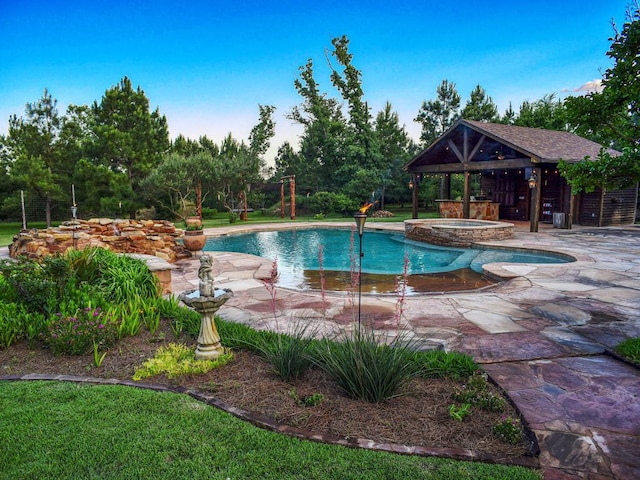 123 County Rd, Paige, TX 78659 - view of pool featuring a patio and a pool with connected hot tub