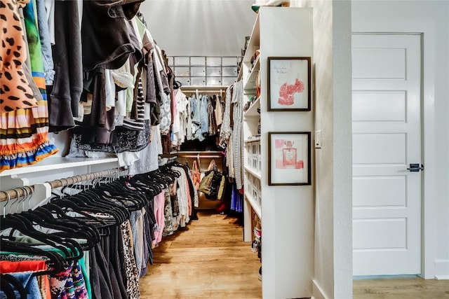 8603 Big Horn Cir, Lago Vista, TX 78645 - walk in closet featuring wood finished floors