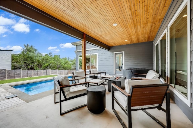 8603 Big Horn Cir, Lago Vista, TX 78645 - fenced backyard featuring an outdoor hangout area and a patio area