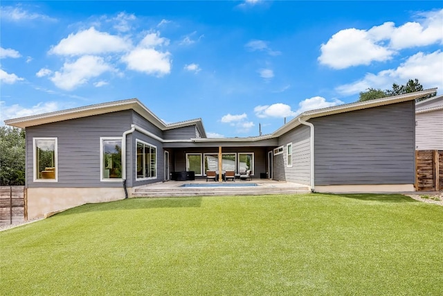 8603 Big Horn Cir, Lago Vista, TX 78645 - rear view of house with a patio, a lawn, and an outdoor living space