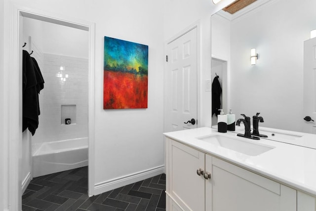 9201 Silver Pine Cv, Austin, TX 78733 - full bath featuring vanity, baseboards, crown molding, and bathing tub / shower combination